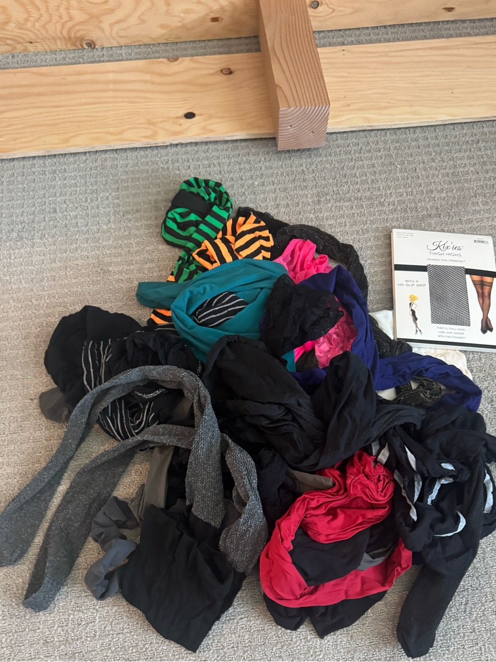 16 full nylons
9 thigh highs 
Most never worn. Maybe a couple worn once.